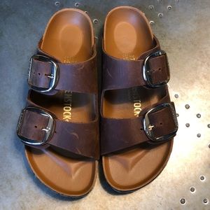 Birkenstock’s - brown leather with gold buckles
